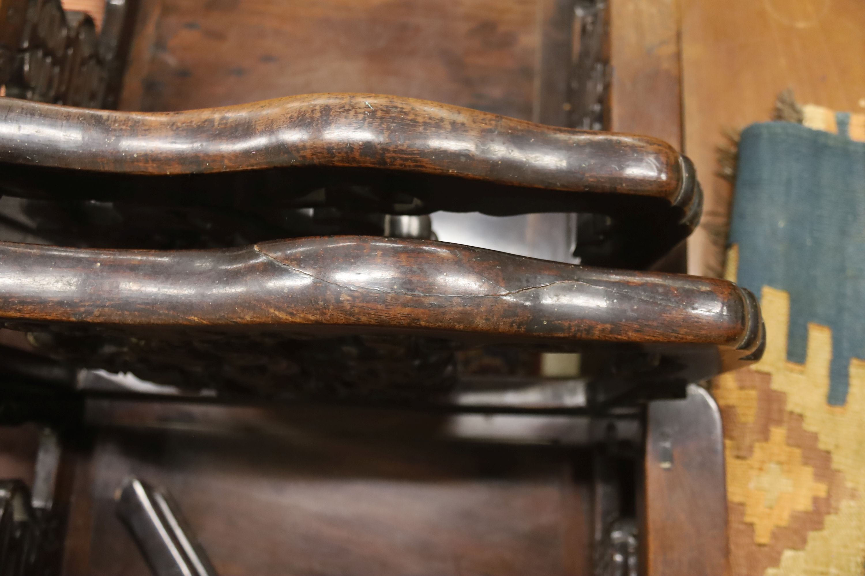 A pair of Chinese carved hongmu elbow chairs (a.f.), width 65cm, depth 48cm, height 96cm